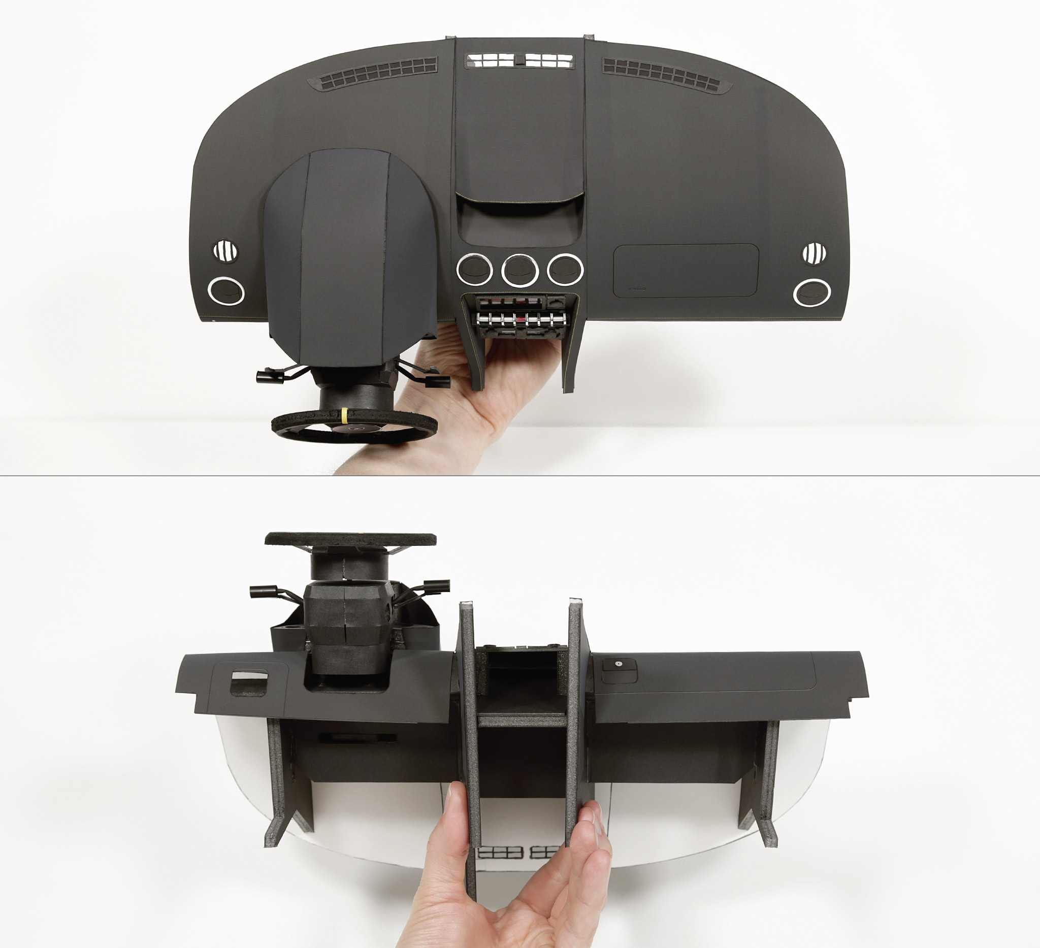 Two views of the finished dashboard; instrument cluster; infotainment; and steering column assembly. Designing all the parts and getting the build right took a couple of months. Parts are made from matte photo print paper; 1000gsm cardboard; 5mm foam board; and various other craft materials. Super happy with the result!