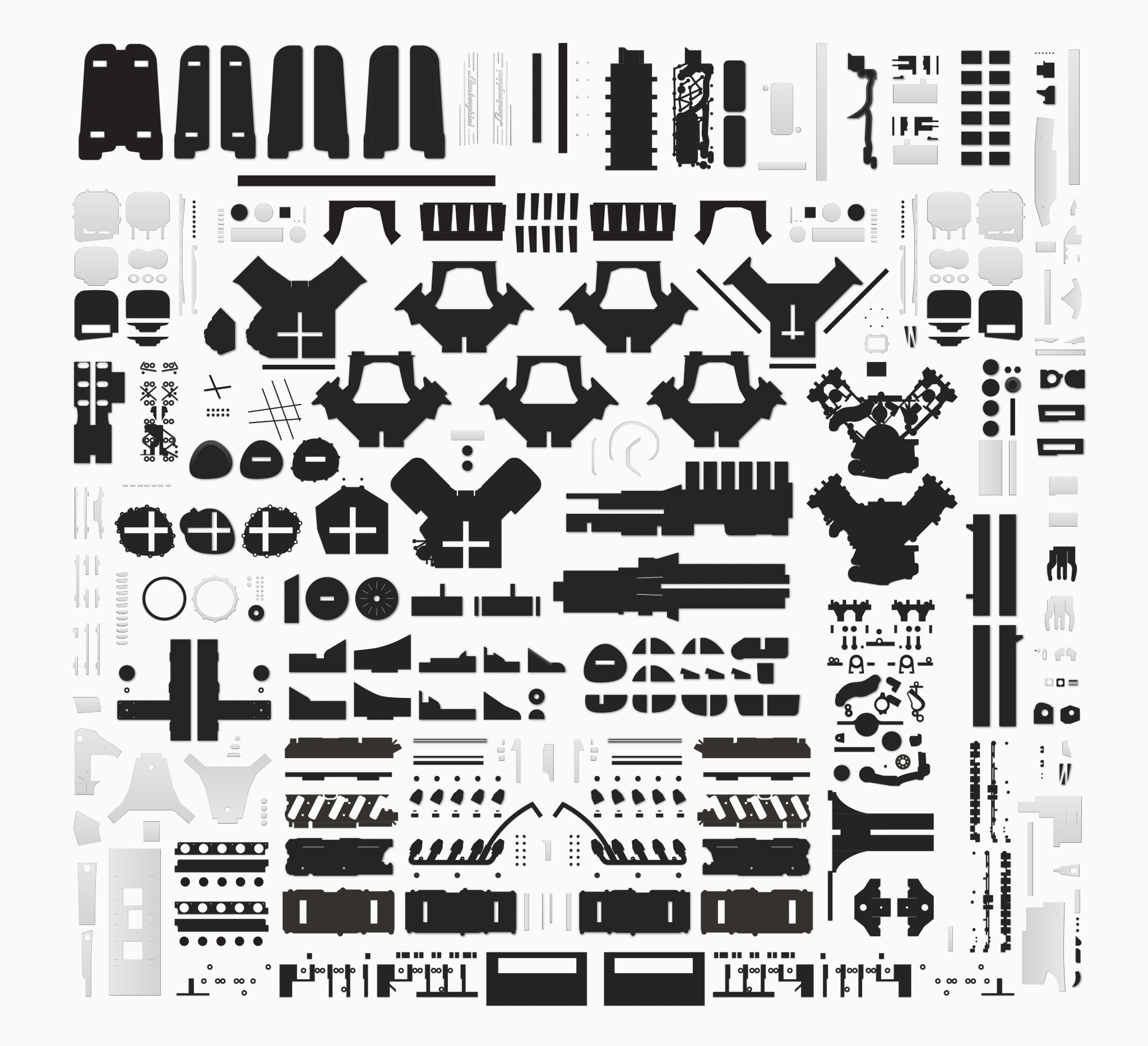 All the 704 individual parts I designed for the V10 engine and transmission. It took about 5 months in my spare time, carefully crafting each piece from scratch – and I cut most by hand. I used my usual materials: 5mm foam core board; 1000gsm cardboard; and various other metallic card stocks and craft materials.