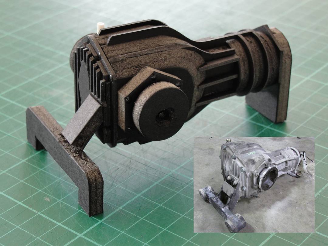 First complete prototype of the front differential/transmission. Made with layers of 5mm foamboard and 219gsm cardboard. Inset pic shows differential from the real car. This actually turned out to be a bit small relative to the chassis, so I built a new version.